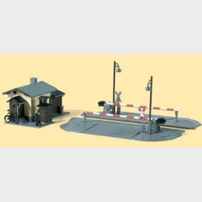 Baneoverskrring med hus