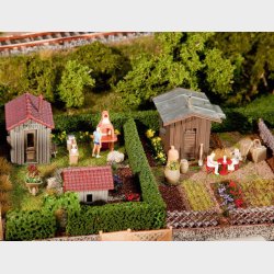 2 stk. kolonihavehus med skur 105 x 74 x 36 mm 