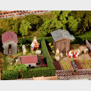 2 stk. kolonihavehus med skur 105 x 74 x 36 mm 