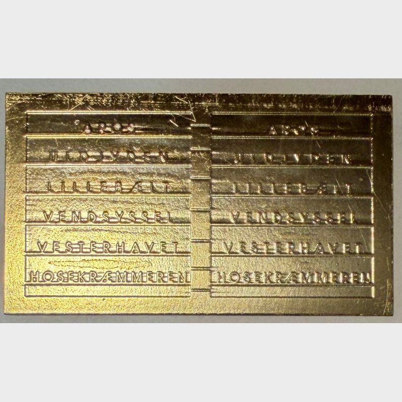 Lyntogs skilte Guldbelagt