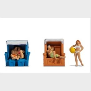 siddende i strandkurv 